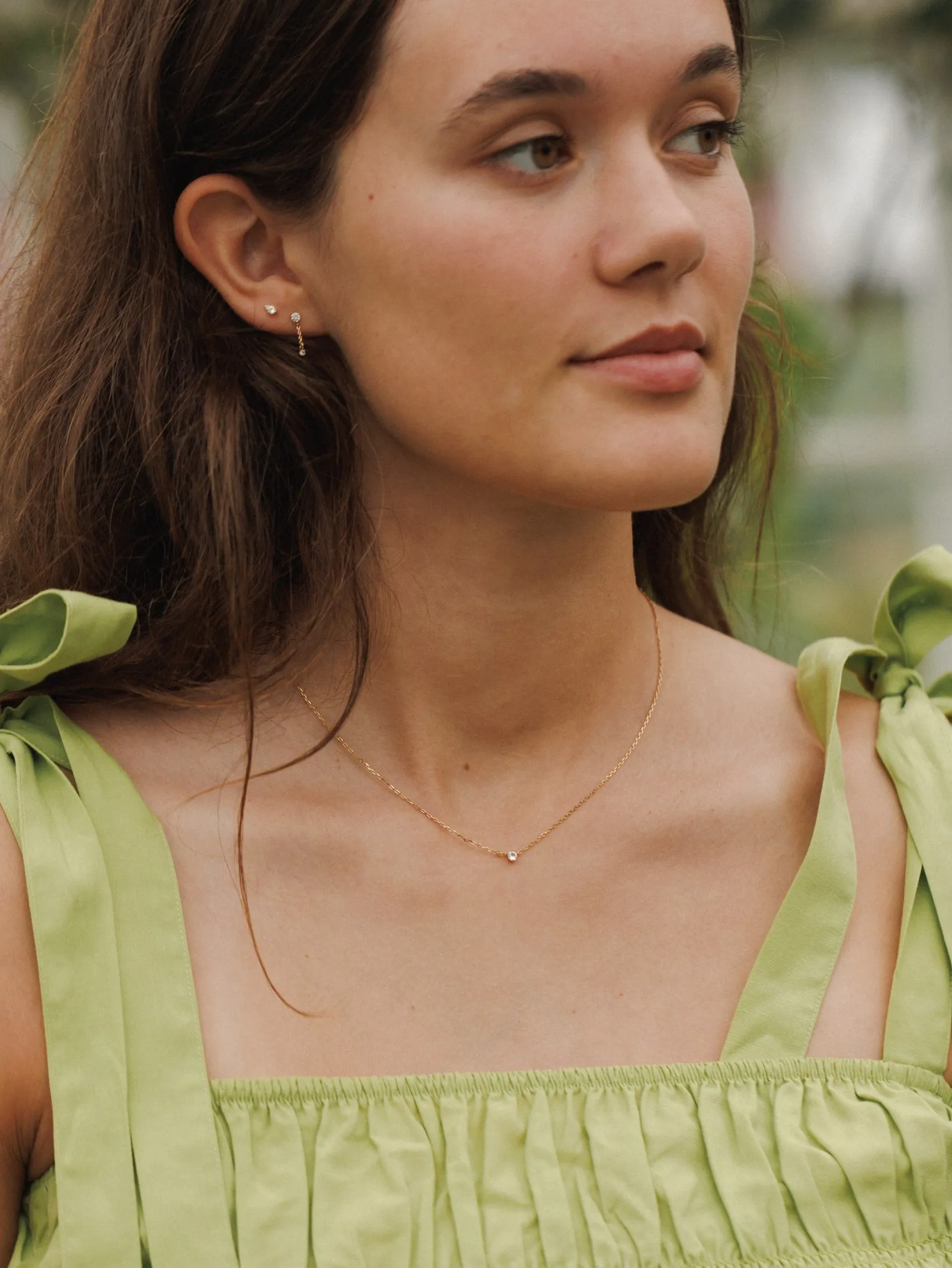 Radiant Sterling Silver Necklace with Polished White Sapphire Gemstone